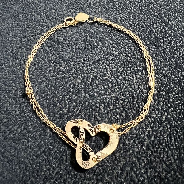 دستبند طلا 18 عیار زنانه سوزیانا مدل قلب بینهایت