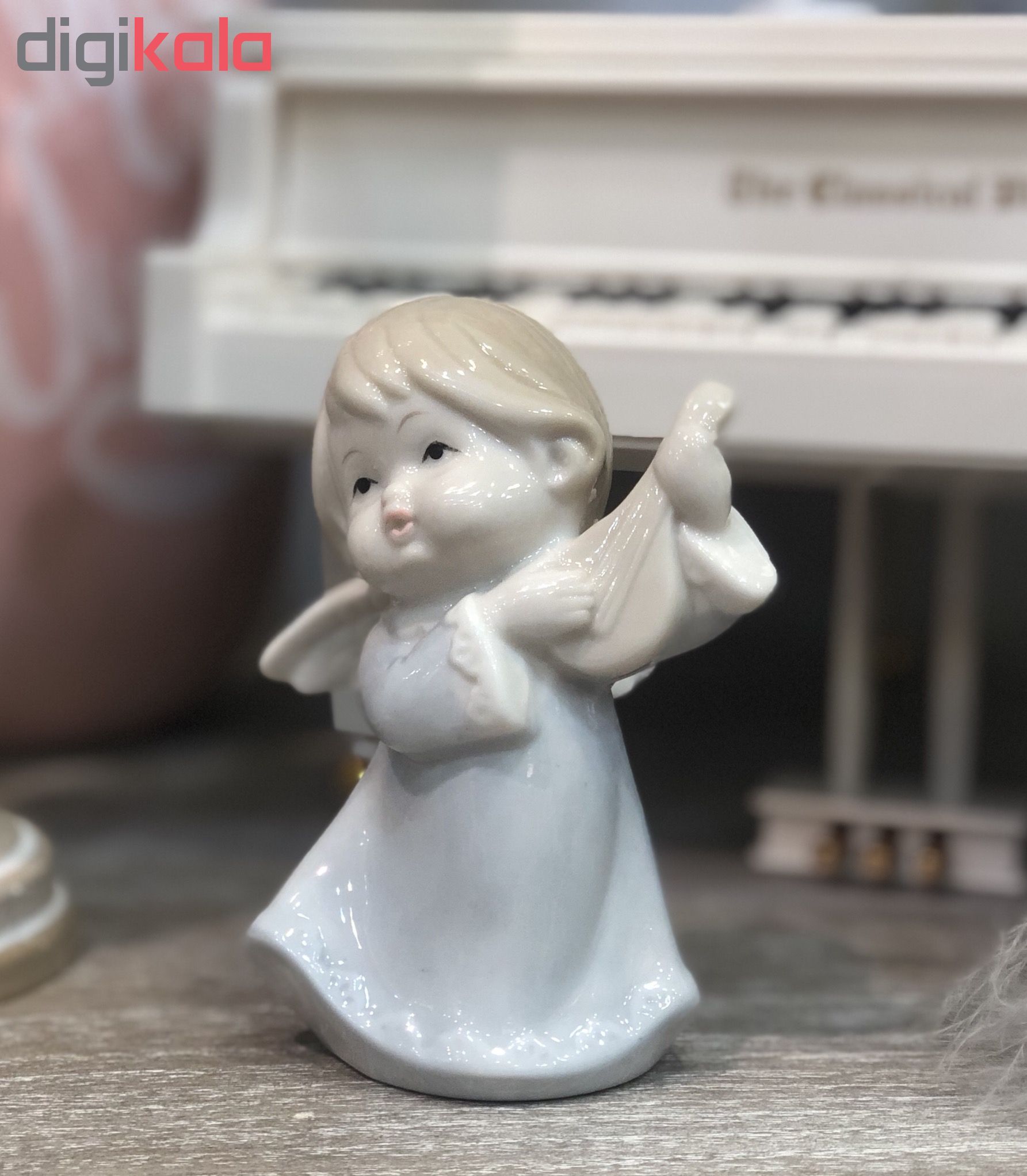مجسمه سرامیکی خانه سفید مدل فرشته ویولن زن