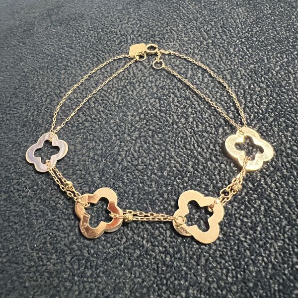 دستبند طلا 18 عیار زنانه سوزیانا مدل گل ال وی