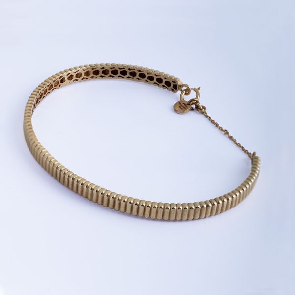 دستبند النگویی طلا 18 عیار زنانه پولک مدل پرتو