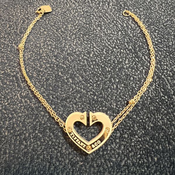 دستبند طلا 18 عیار زنانه سوزیانا مدل قلب تی اف