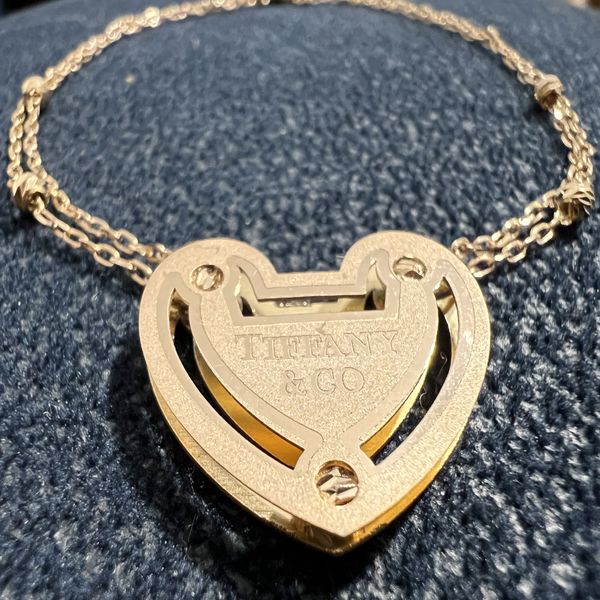 دستبند طلا 18 عیار زنانه سوزیانا مدل قلب تی اف ان
