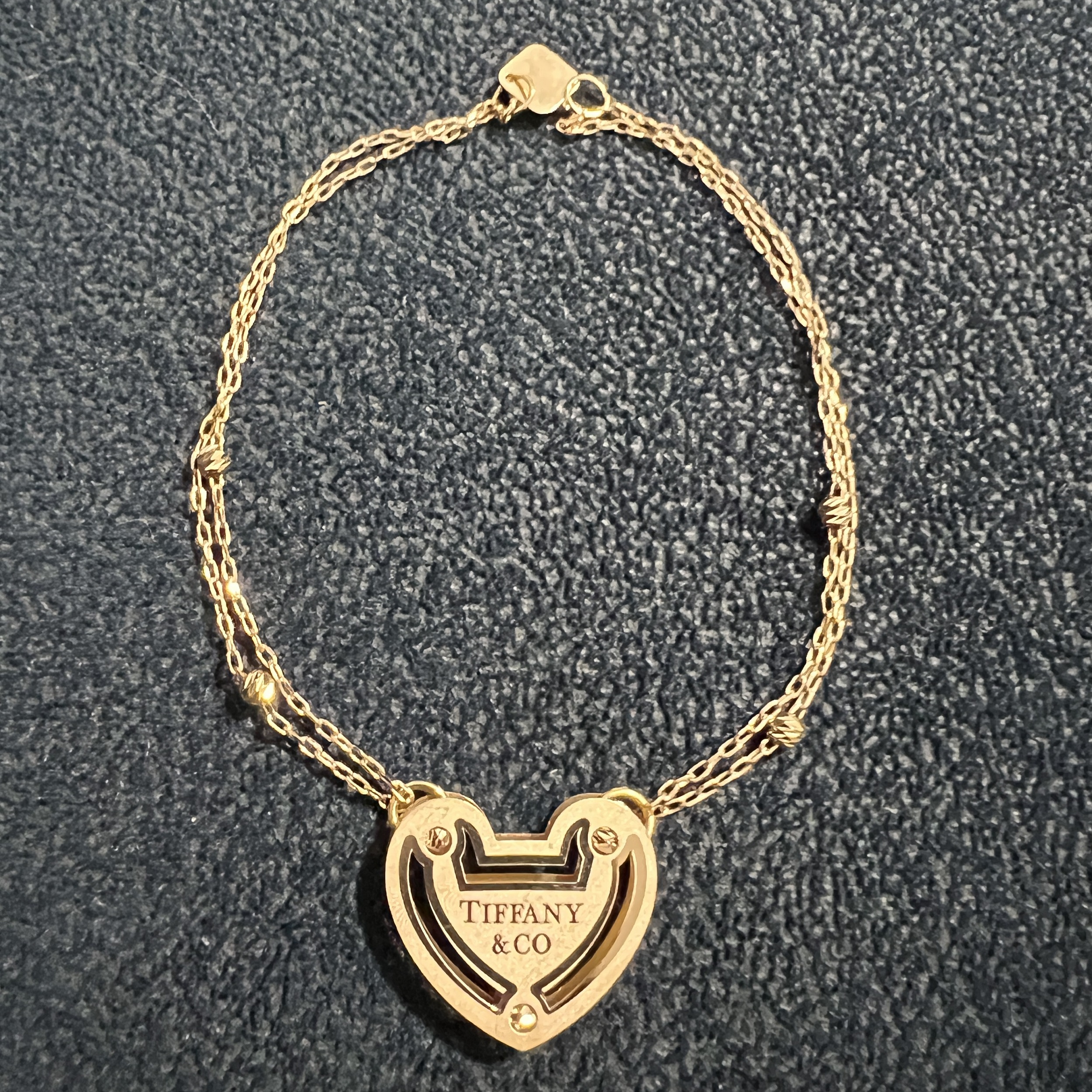 دستبند طلا 18 عیار زنانه سوزیانا مدل قلب تی اف ان